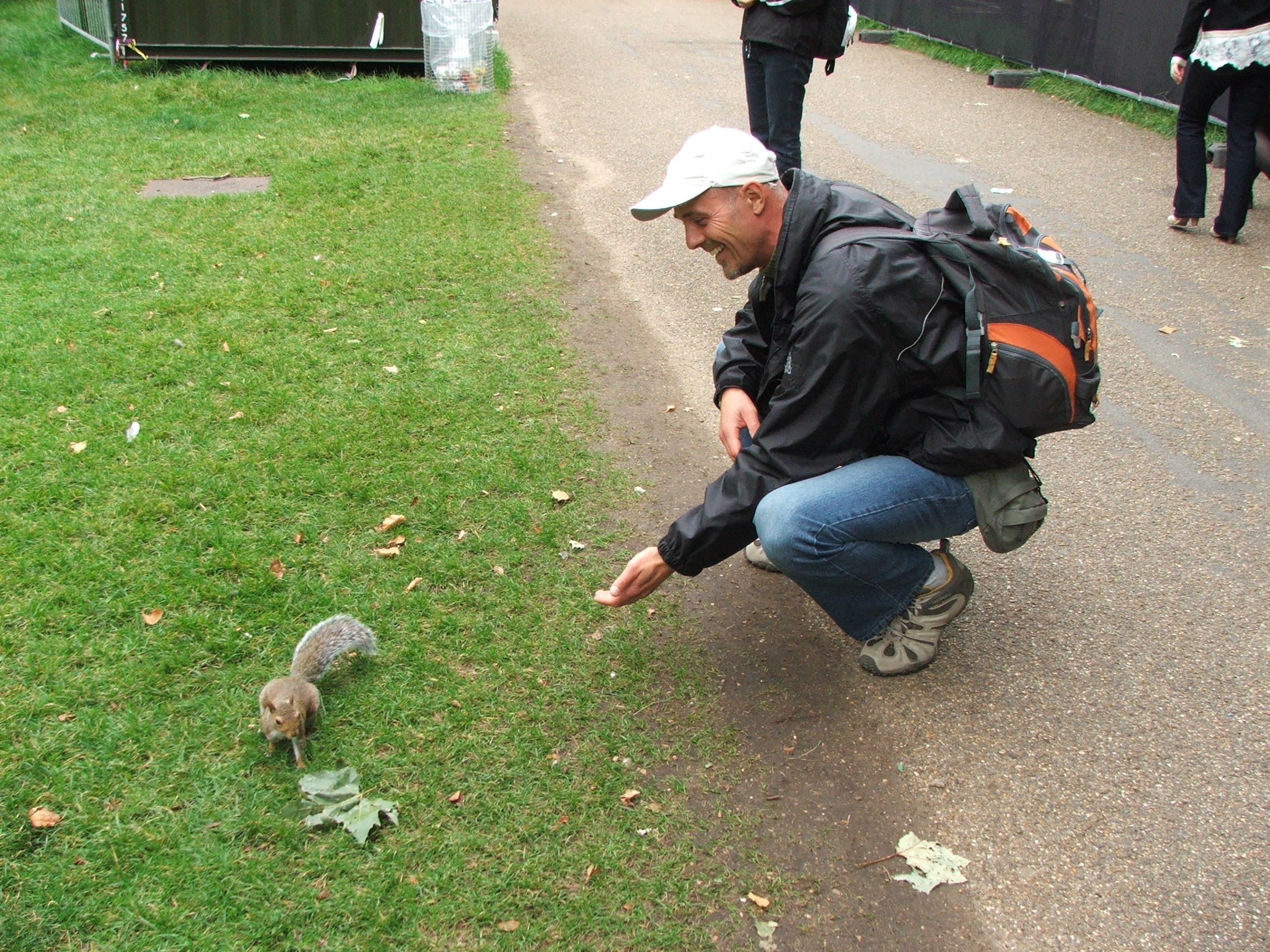 Trying to make friend with a lovely grey squirrel in St. James Park, London